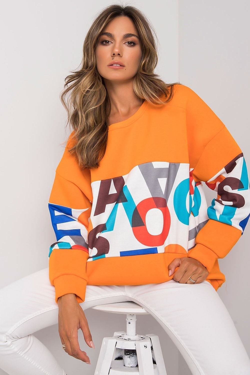 Women's sweatshirt with long sleeves, a round neckline, and a stylish lettered design. Made with cruelty-free materials like organic cotton and recycled polyester.

